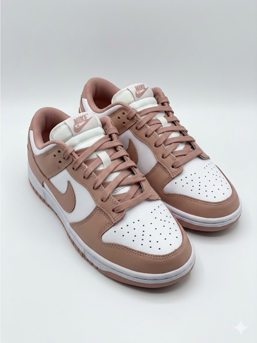 Nike Women's Dunk Low-Top Sneakers in Dusty Rose and White